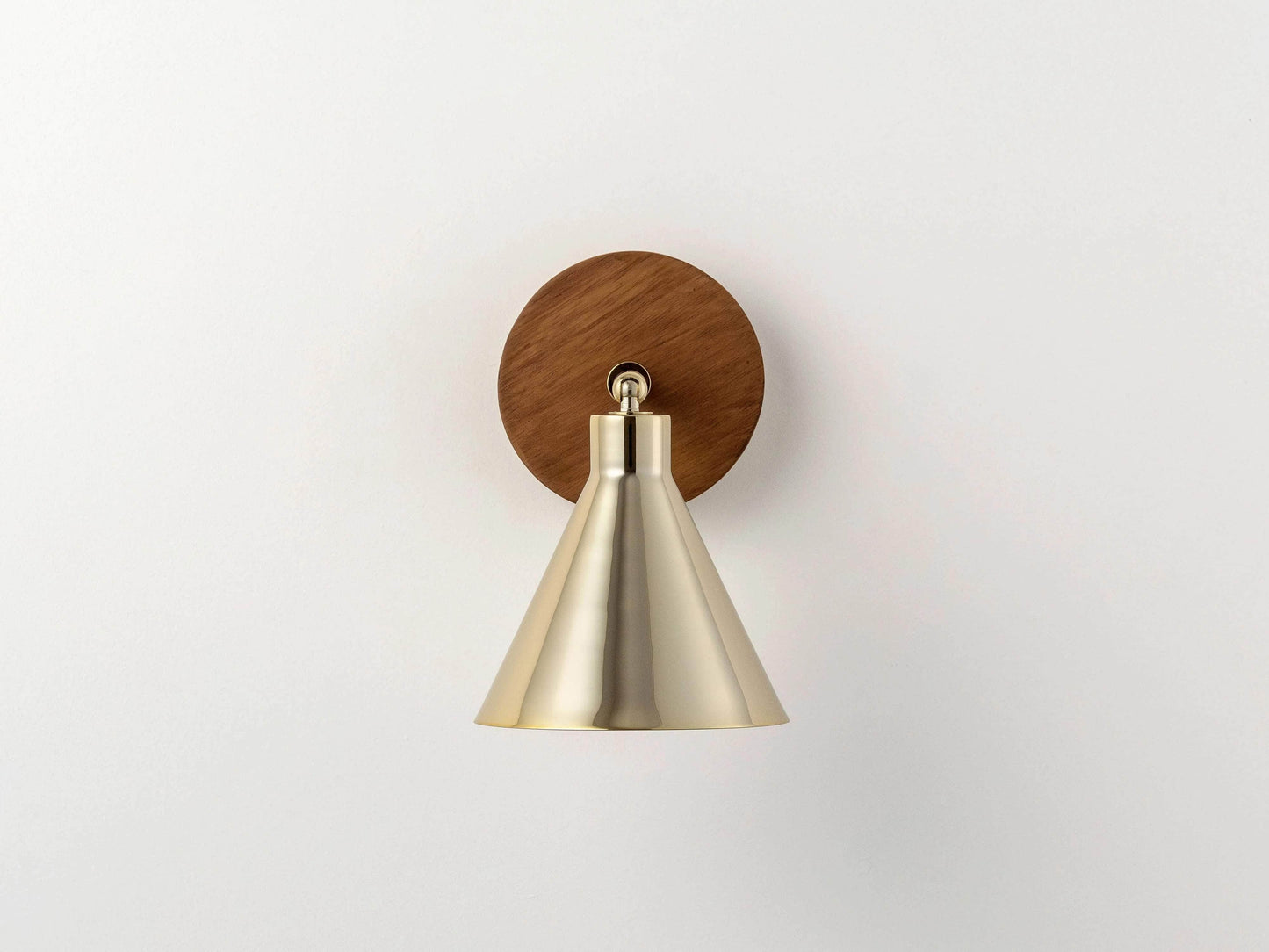 Brass cone wall light
