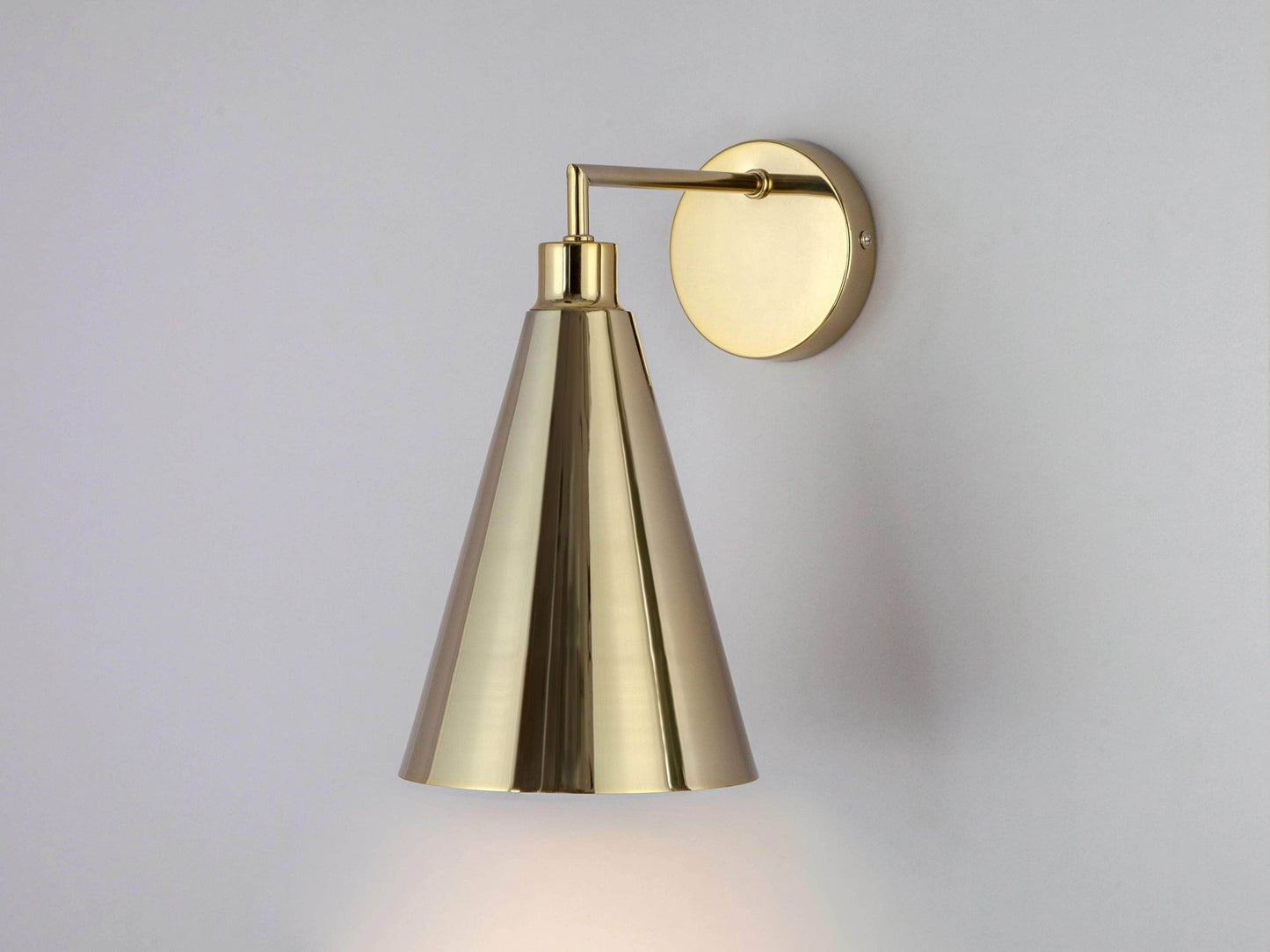 Brass cone shade wall light