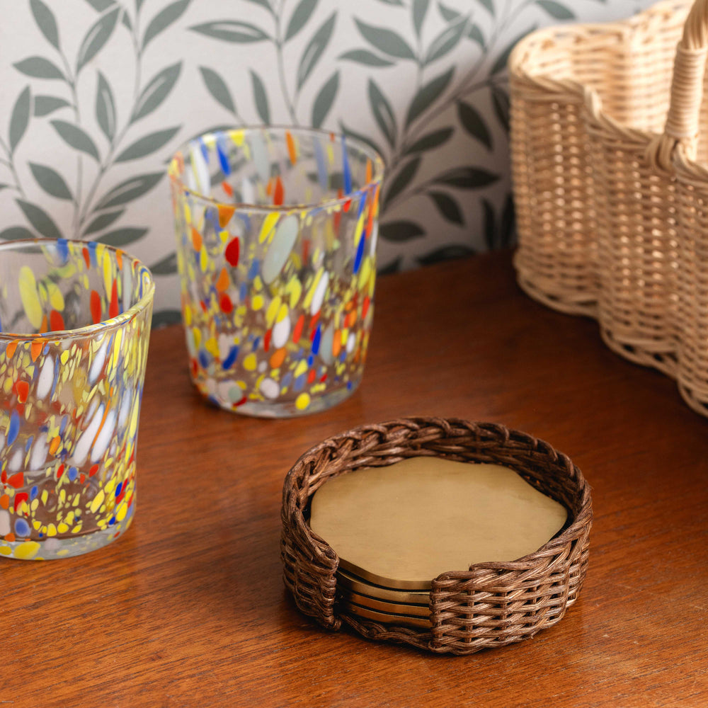 Wavy Brass Coasters in Rattan Holder - Set of Four