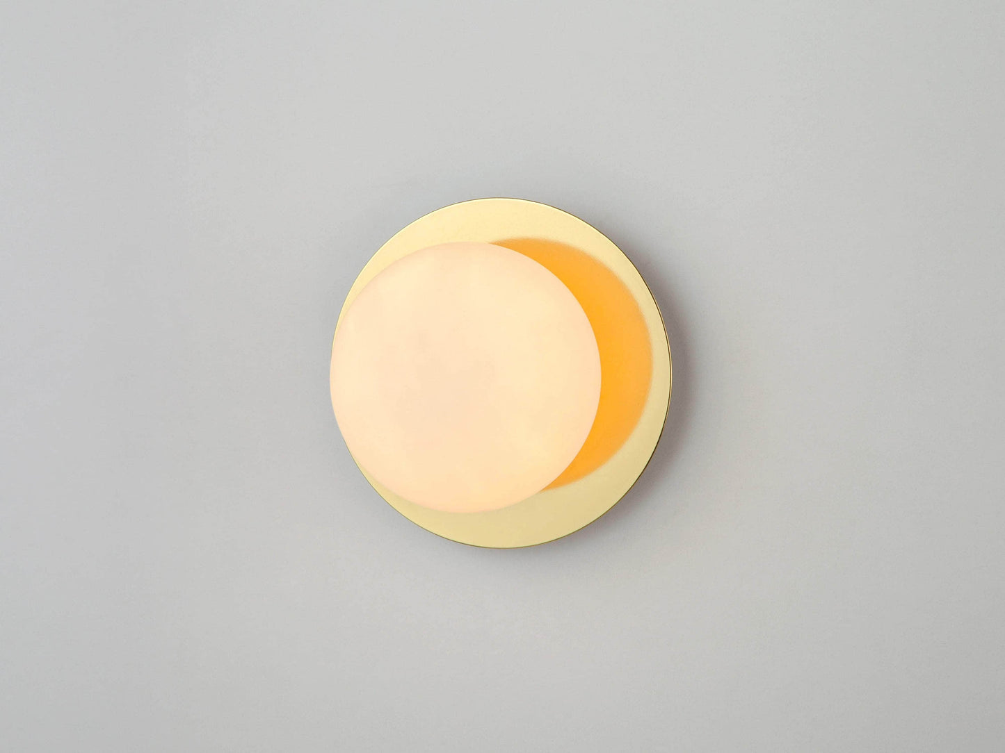 Brass opal disc wall light