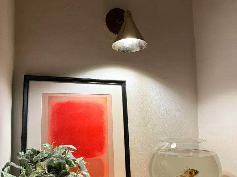 Sand cone wall light