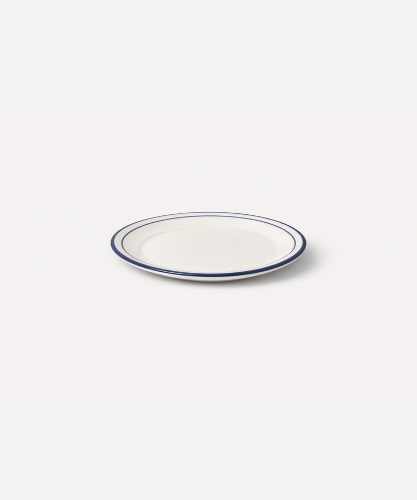Rim Bread Plate in Deep Blue — slim hand-painted band on a crisp white ground, Carmen del Viboral ceramic