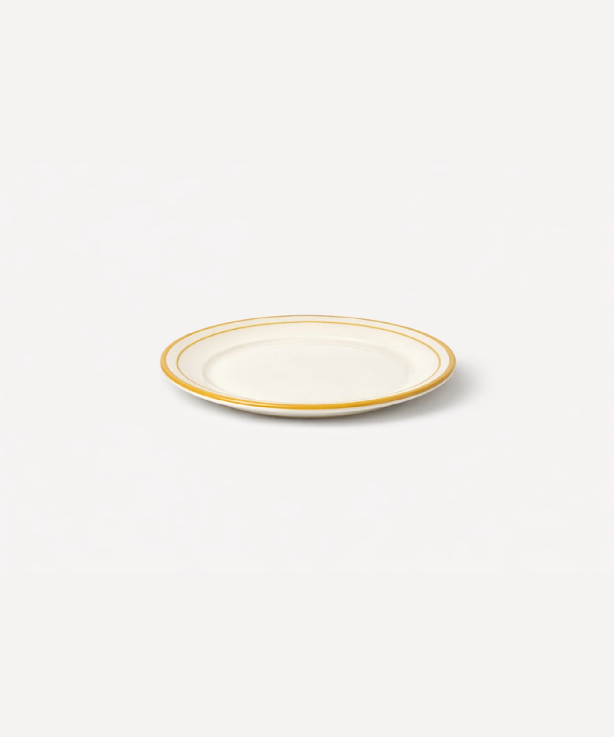 Rim Bread Plate in Golden Yellow — slim hand-painted band on a crisp white ground, Carmen del Viboral ceramic