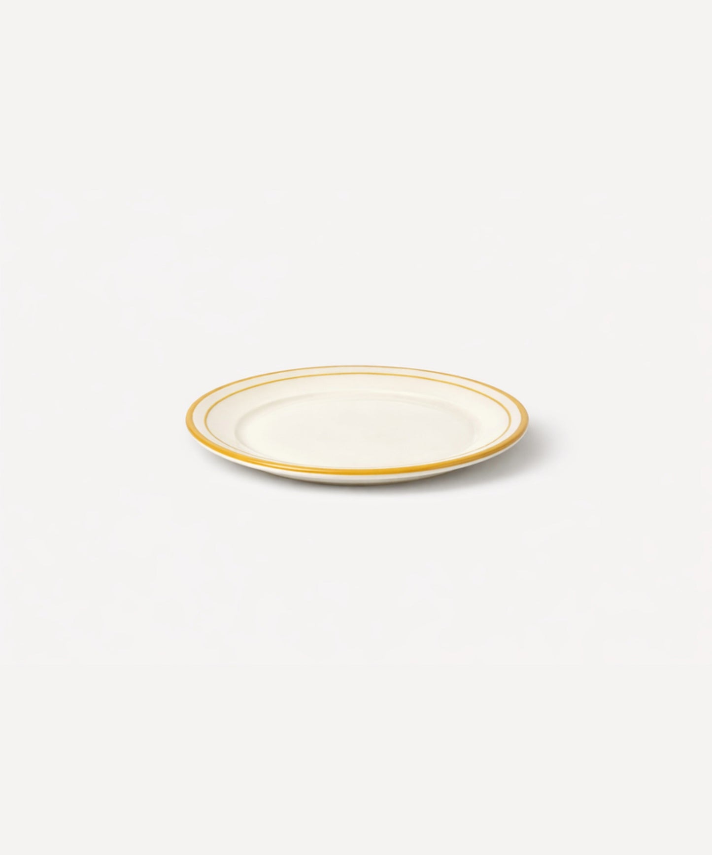 Rim Bread Plate in Golden Yellow — slim hand-painted band on a crisp white ground, Carmen del Viboral ceramic