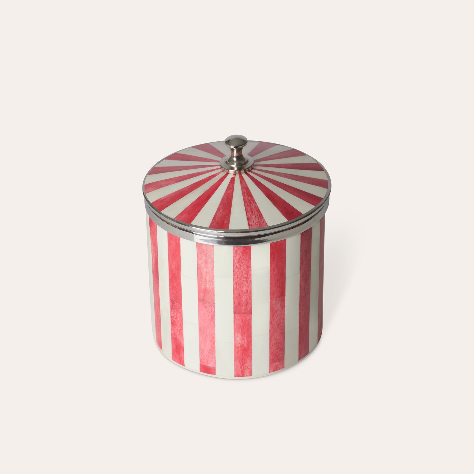 Red and white striped ice bucket with a chrome silver lid on a light beige background.