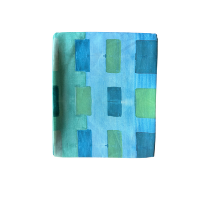 Blue Tapestry linen tablecloth styled on dining table with matching napkins - Goldie Home