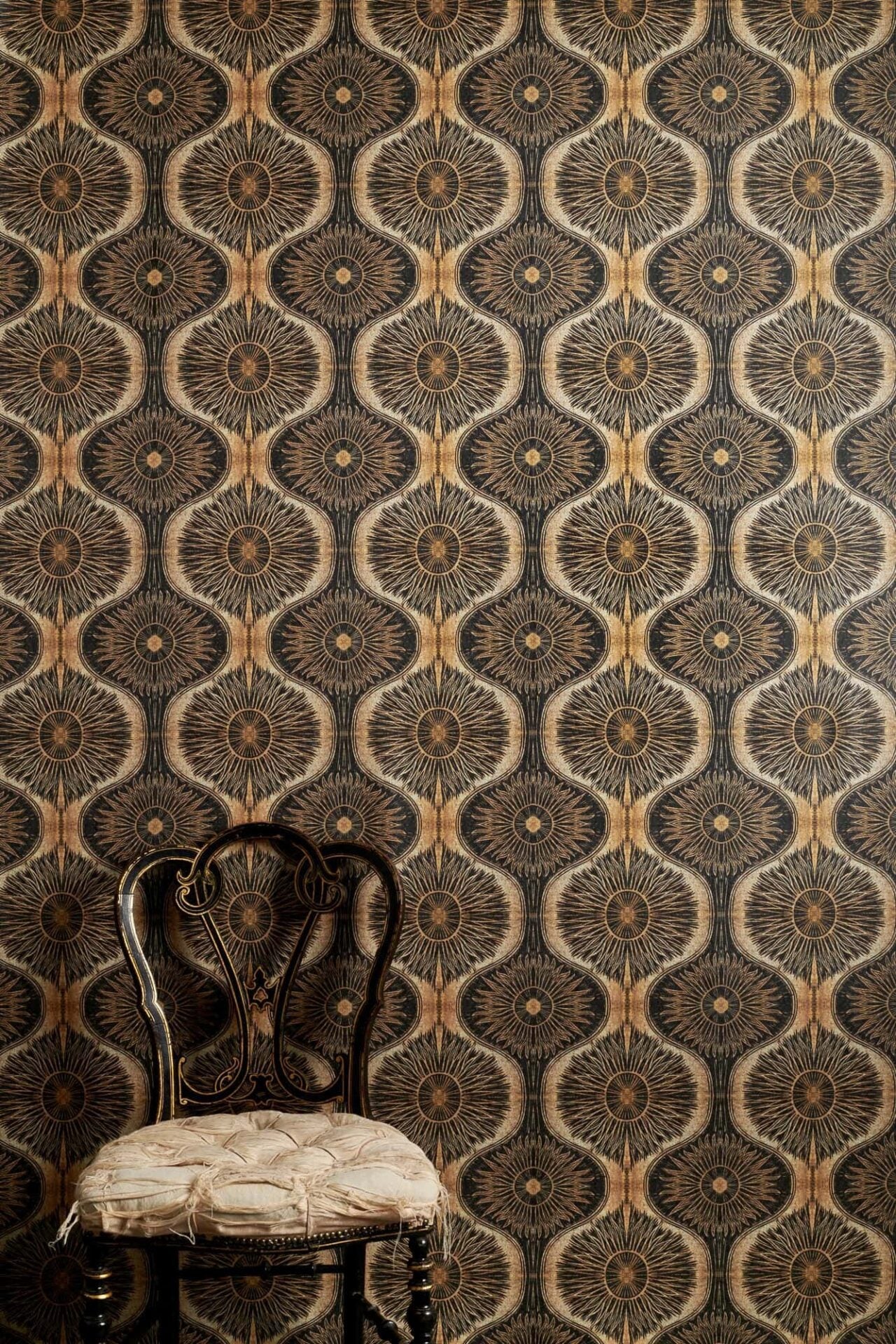 Bibana Gold wallpaper in black and gold with textured semi-metallic finish