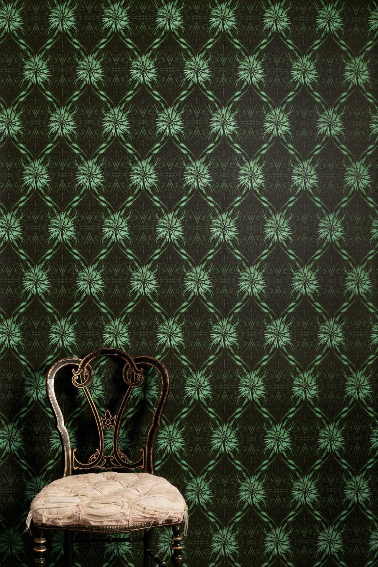 Talon trellis lino print wallpaper with dense layered pattern and moody depth