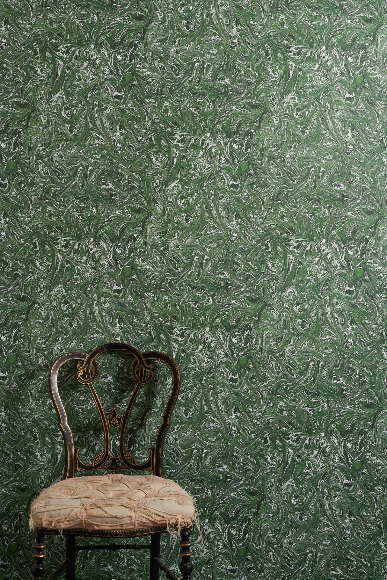Meredith Malachite wallpaper in deep green marbled pattern with swirling white tones