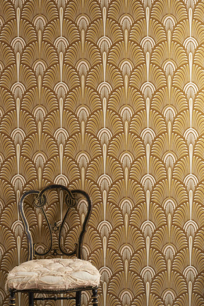 Bang Mustard wallpaper with bold art deco geometric pattern in mustard yellow, soft brown, peach and cream tones with a subtle metallic sheen