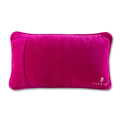 back view of the luxe pink velvet chic hand needlepoint pillow with a furbish text print and logo located on the bottom right-hand corner of the pillow