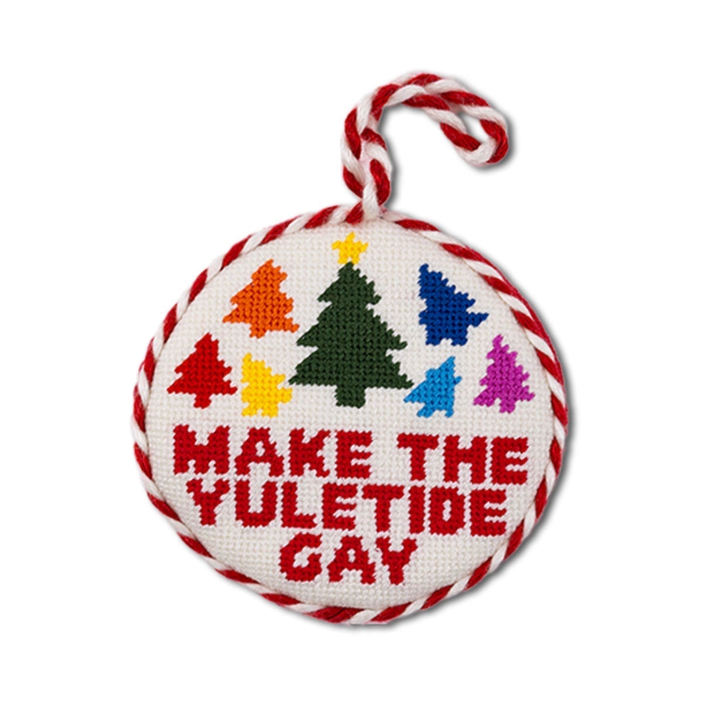 Decorative ornament with colorful trees and text 'Make the Yuletide Gay' on a white background