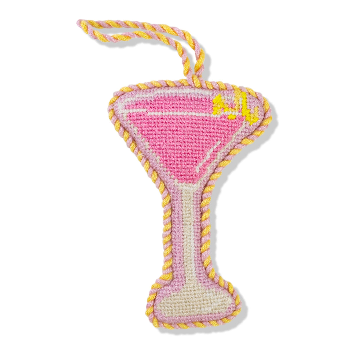 Pink martini glass-shaped toy with yellow accents on a white background