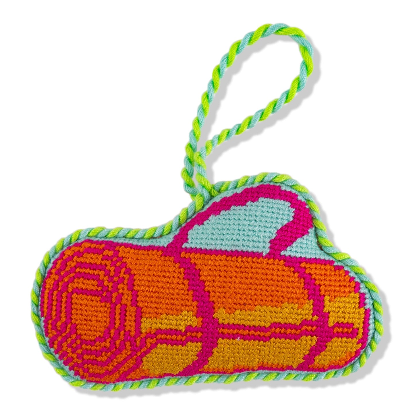 Colorful knitted heart-shaped keychain with a pattern on a white background