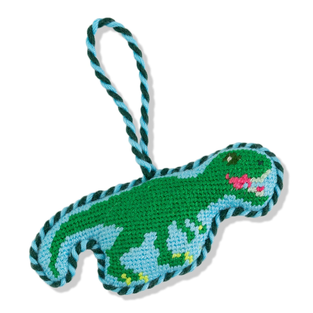 Crocheted dinosaur toy with a rope handle on a white background