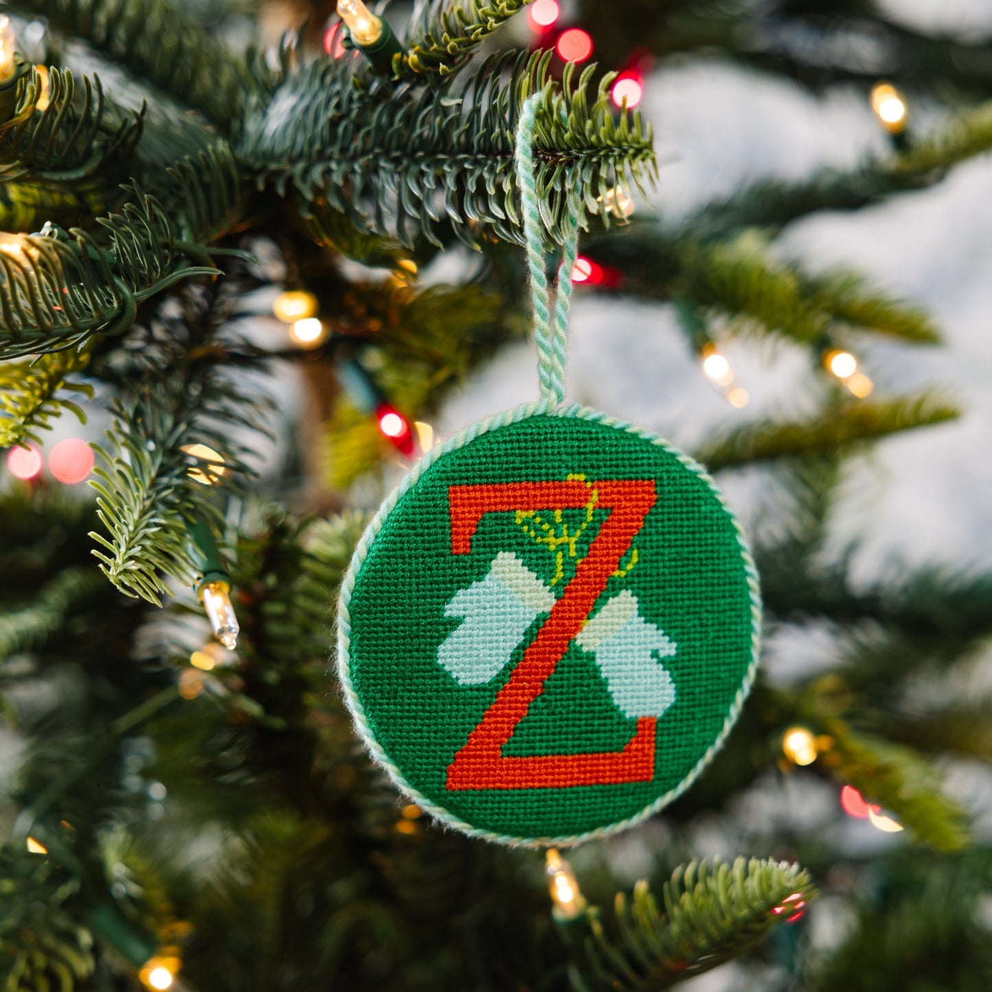 Decorative ornament with a letter 'Z' on a Christmas tree