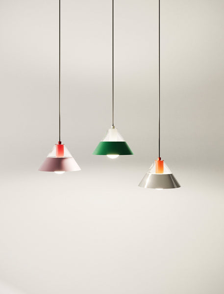 FIFTY FIFTY Lamp featuring three pendant lights with glass and metal shades in pink, green, and gray colors.
