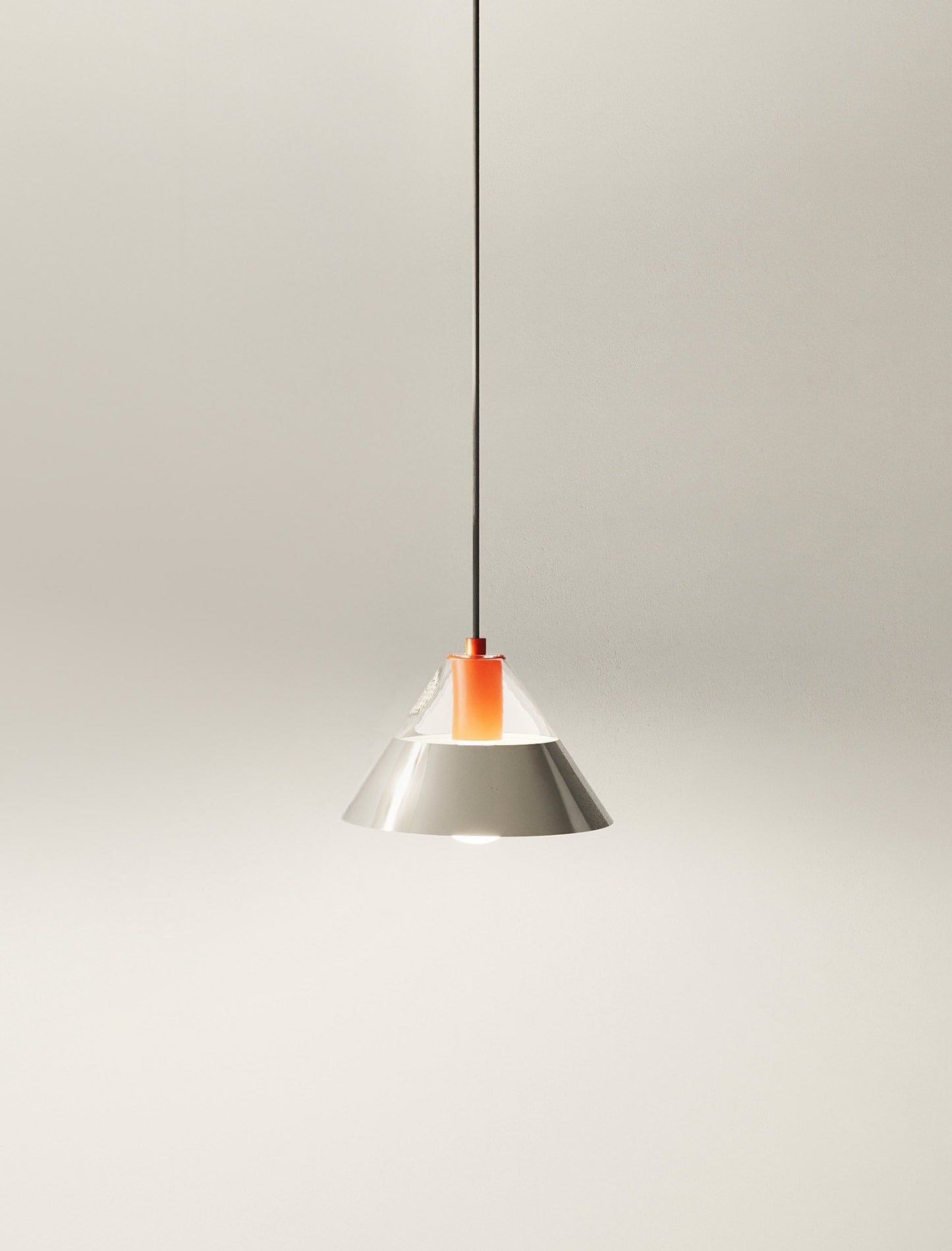 FIFTY FIFTY Lamp with glass and metal shades providing balanced warm and focused lighting in a sleek pendant design.