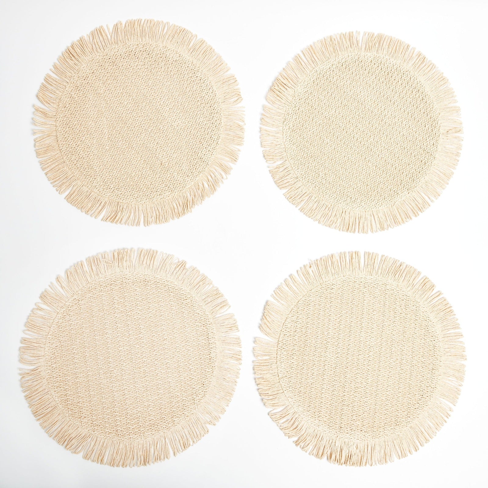 Elia Woven Rattan Round Fringed Placemats (set of 4)