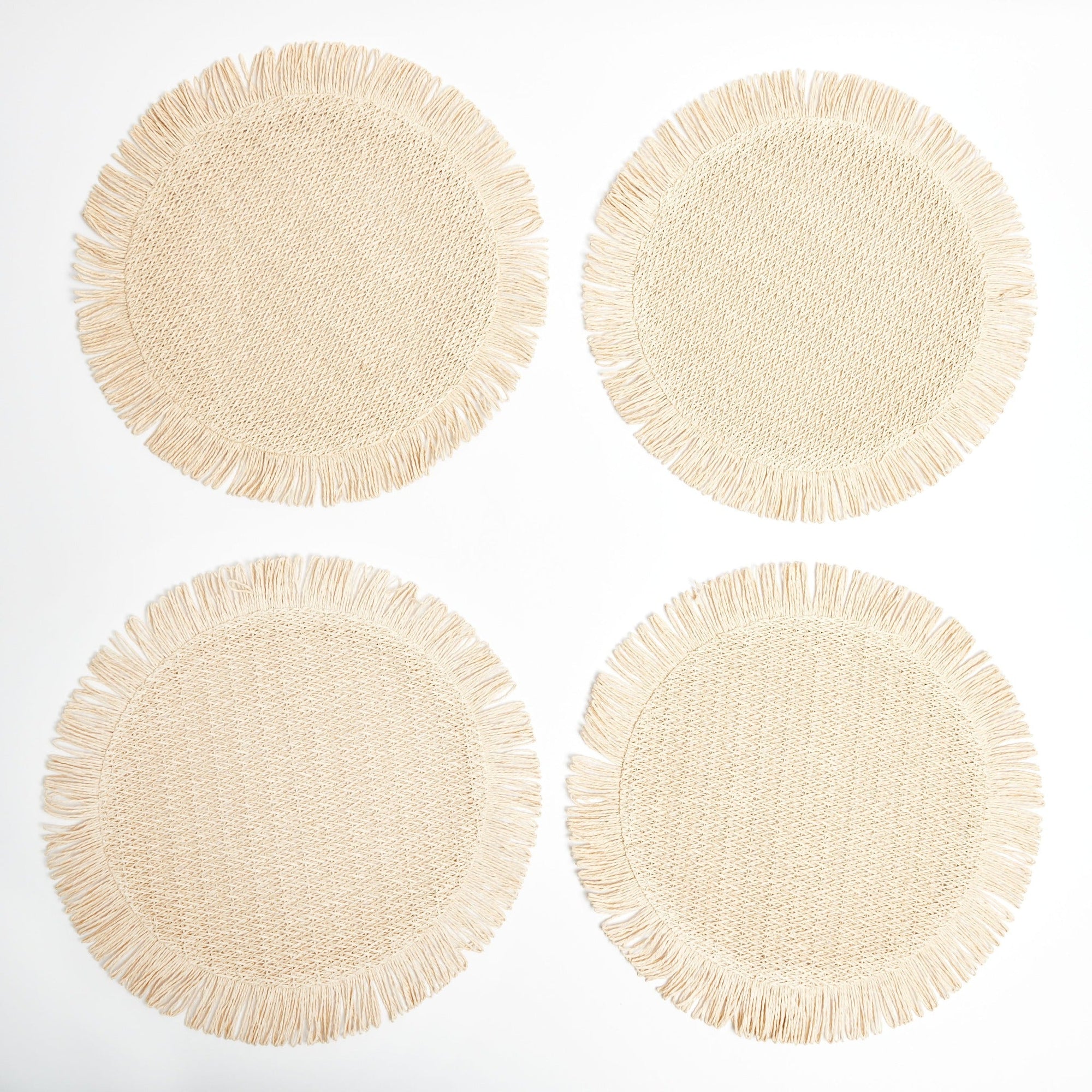 Elia Woven Rattan Round Fringed Placemats (set of 4)