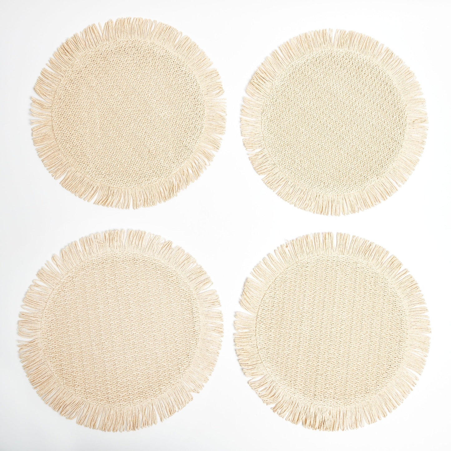 Elia Woven Rattan Round Fringed Placemats (set of 4)