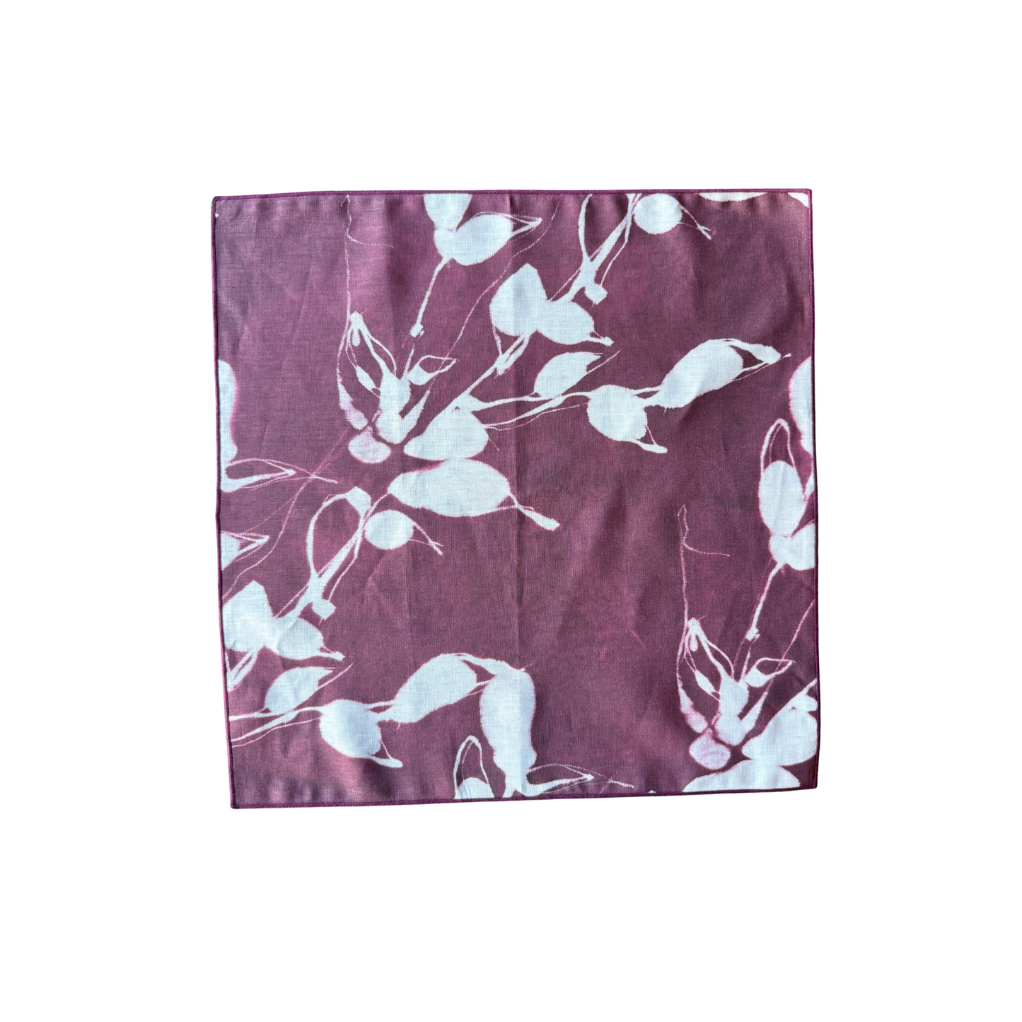 Porto Print Aubergine linen dinner napkin flat lay close up of hand-painted floral detail - Goldie Home