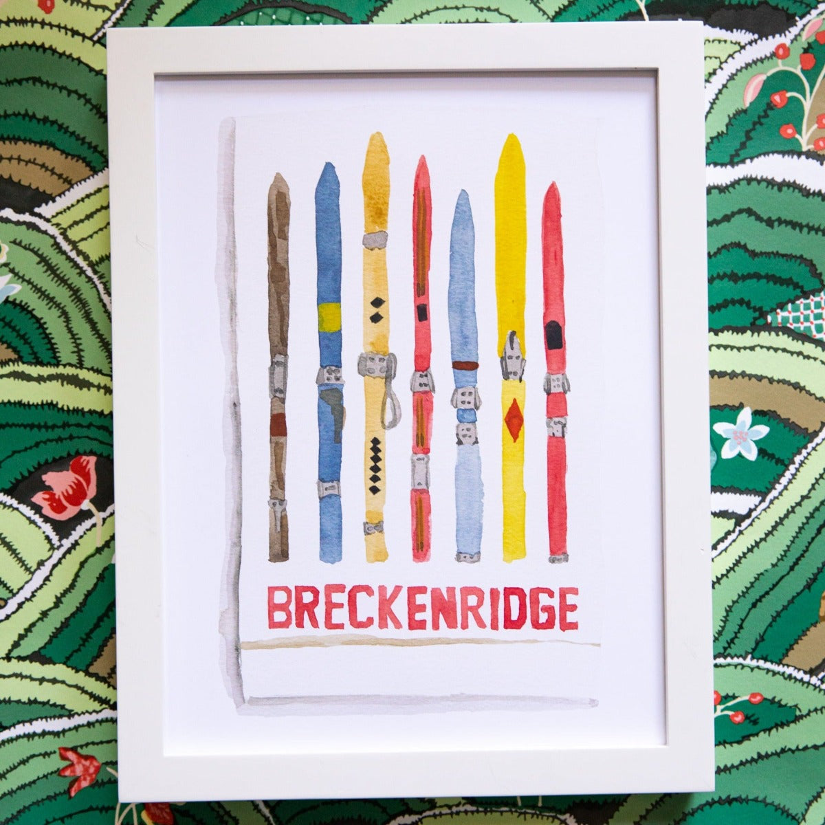 Breckenridge Matchbook - Furbish Studio, A Breckenridge Matchbook watercolor print featuring multiple colorful Ski boards arranged vertically in a white frame with a white background