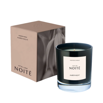 


Black candle with 'Atelier Noité' label and packaging on a white background