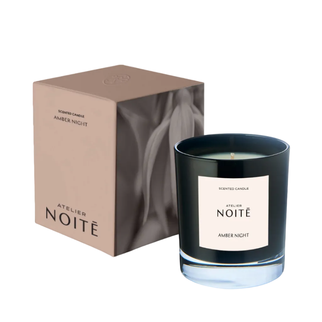 


Black candle with 'Atelier Noité' label and packaging on a white background
