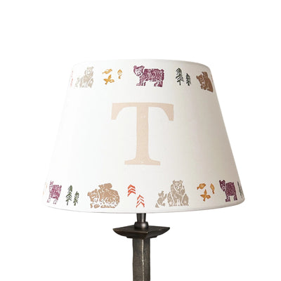 Studio Zef personalised bear lampshade with colourful animal print and large initial 'T'. An empire lampshade designed for kids lighting and thoughtful new parent gifts.