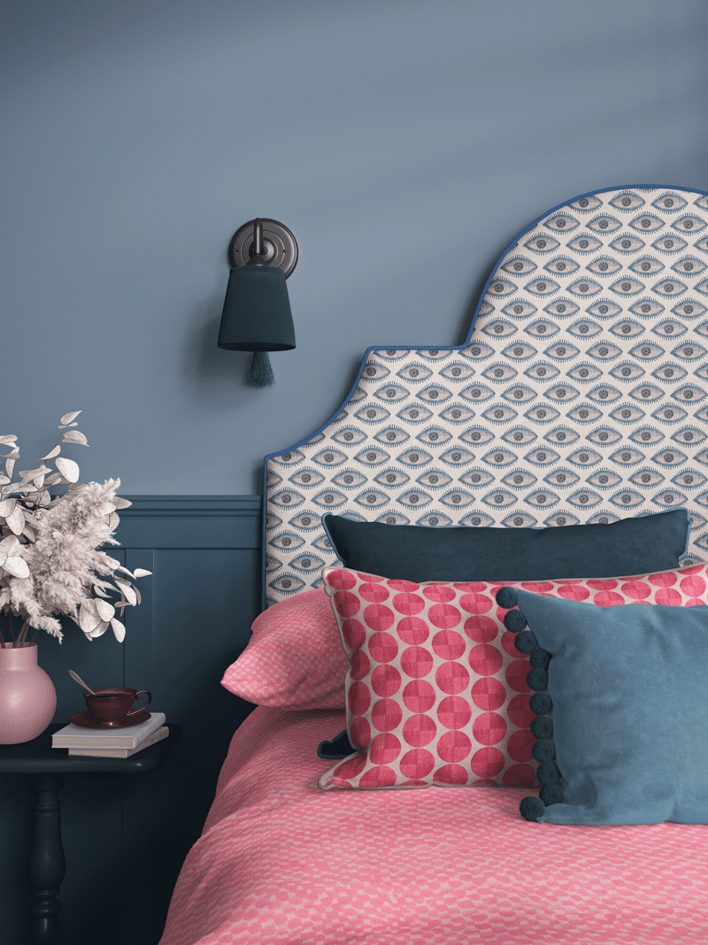 Thalia Botsari collection featuring artisanal interior textiles in a colorful bedroom