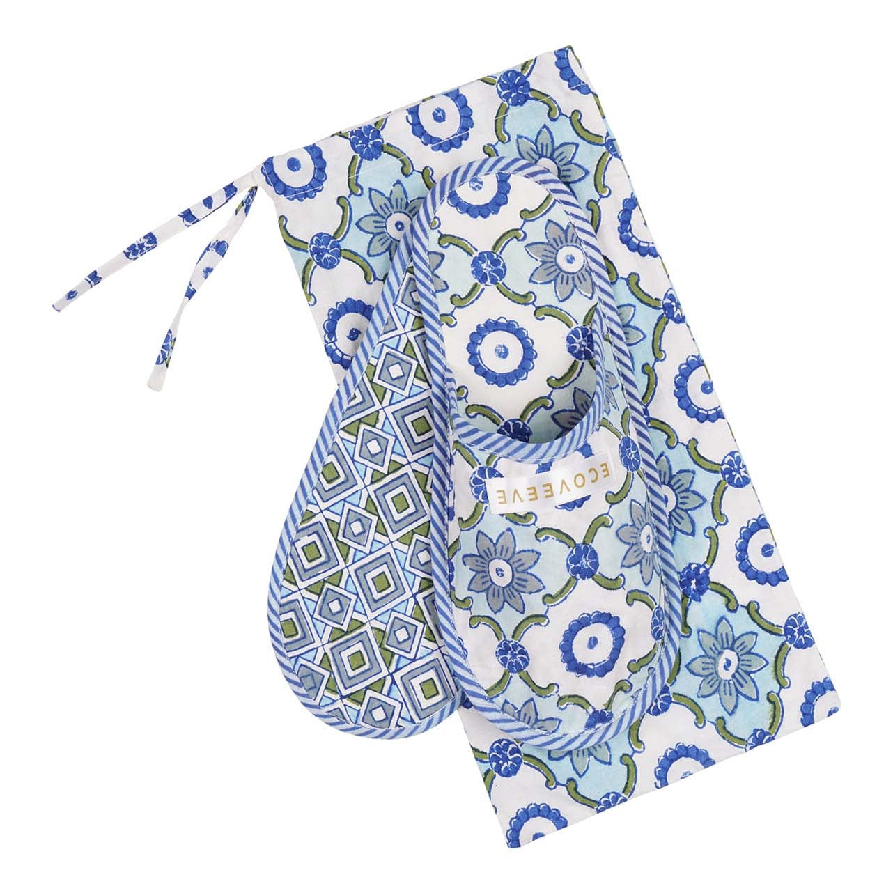 A pair of hand block-printed cotton slippers with blue and white floral patterns.