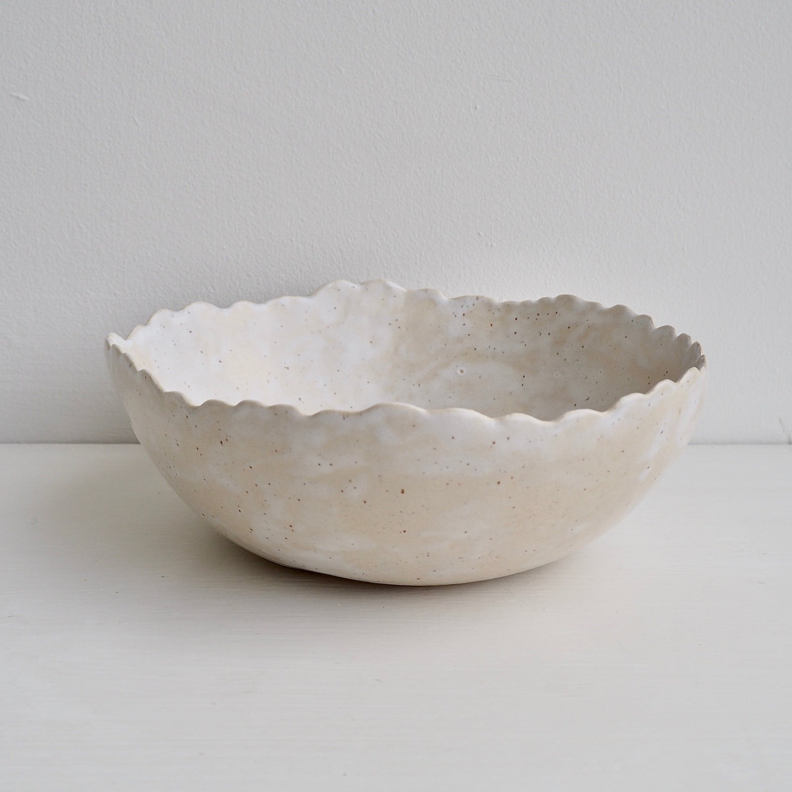 Handmade Cream/White Speckled Scalloped Ceramic Serving Bowl.