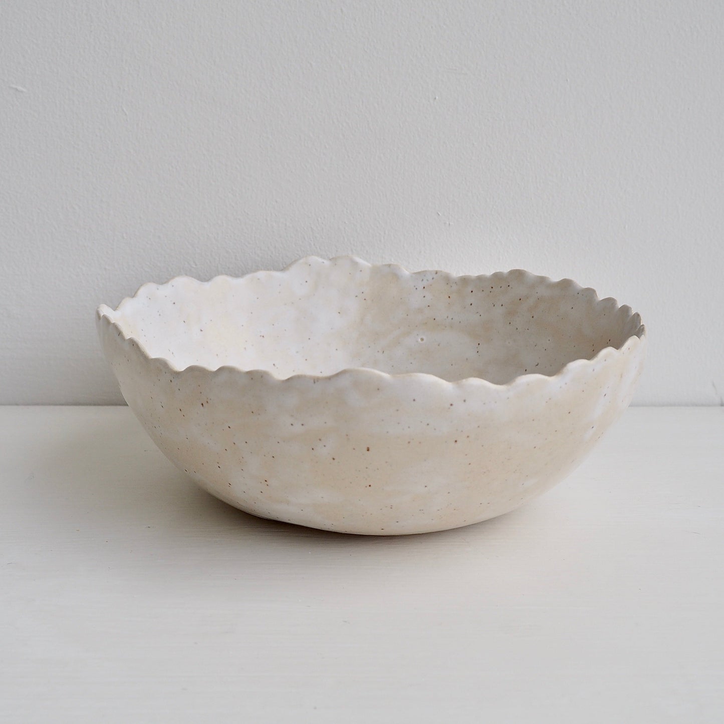 Handmade Cream/White Speckled Scalloped Ceramic Serving Bowl.