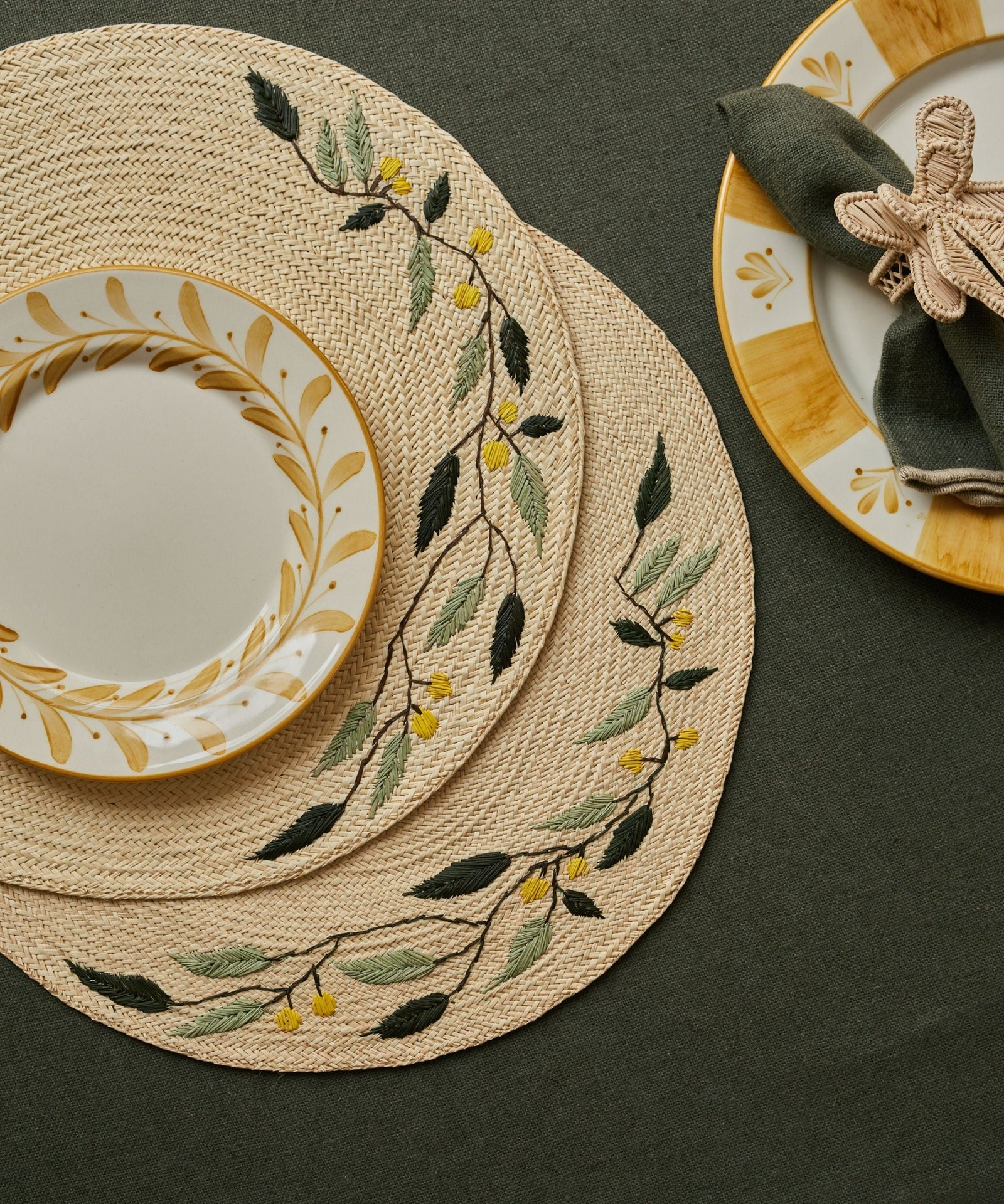 Embroidered Leaf placemat, close-up of the leaf motif and iraca weave