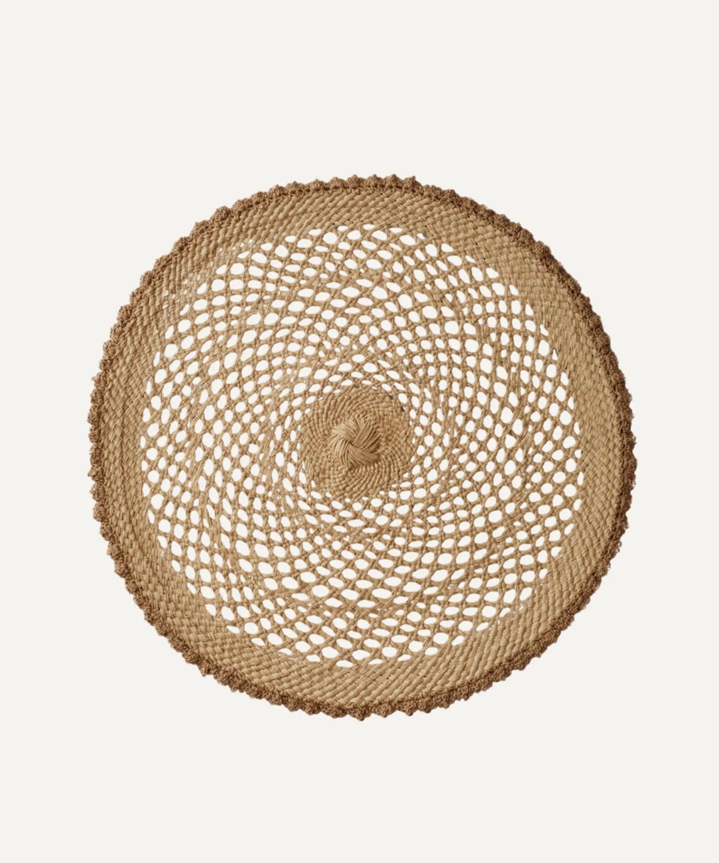 Crochet placemat in crudo, handwoven iraca palm, styled on a table