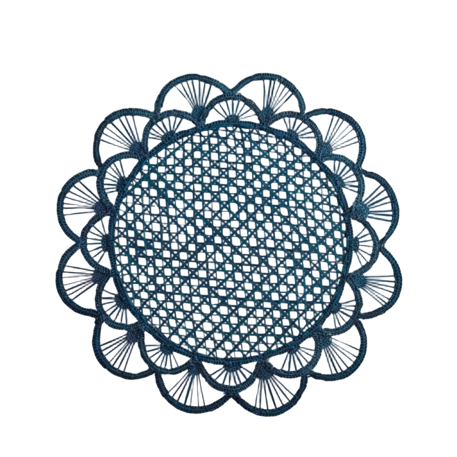 Margarita placemat in deep blue, handwoven iraca palm, styled on a table