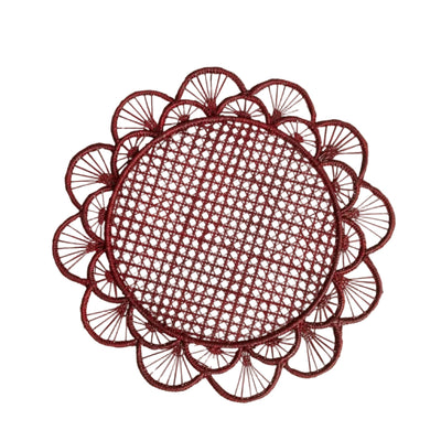 Margarita placemat in marsala, handwoven iraca palm, styled on a table