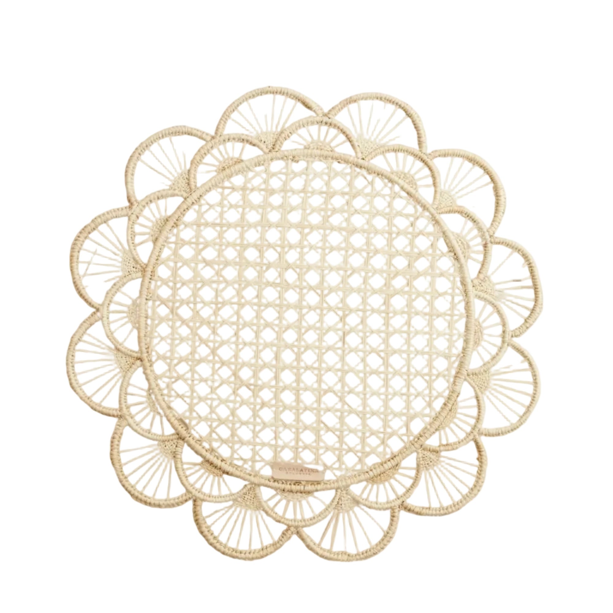 Margarita placemat in natural, handwoven iraca palm, styled on a table