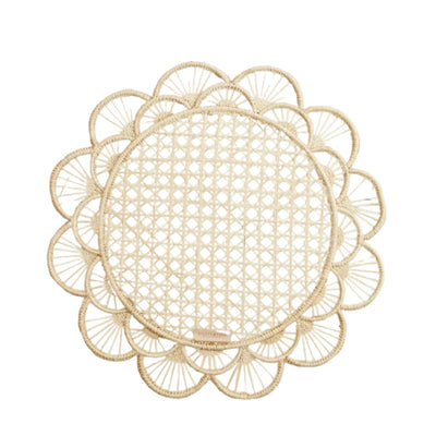 Margarita placemat in natural, handwoven iraca palm, styled on a table