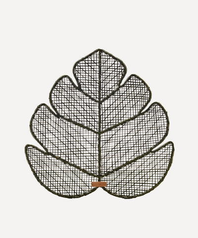Hoja Palma placemat, handwoven iraca palm-leaf weave, styled on a table