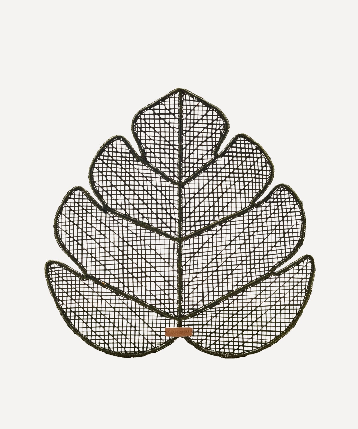 Hoja Palma placemat, handwoven iraca palm-leaf weave, styled on a table