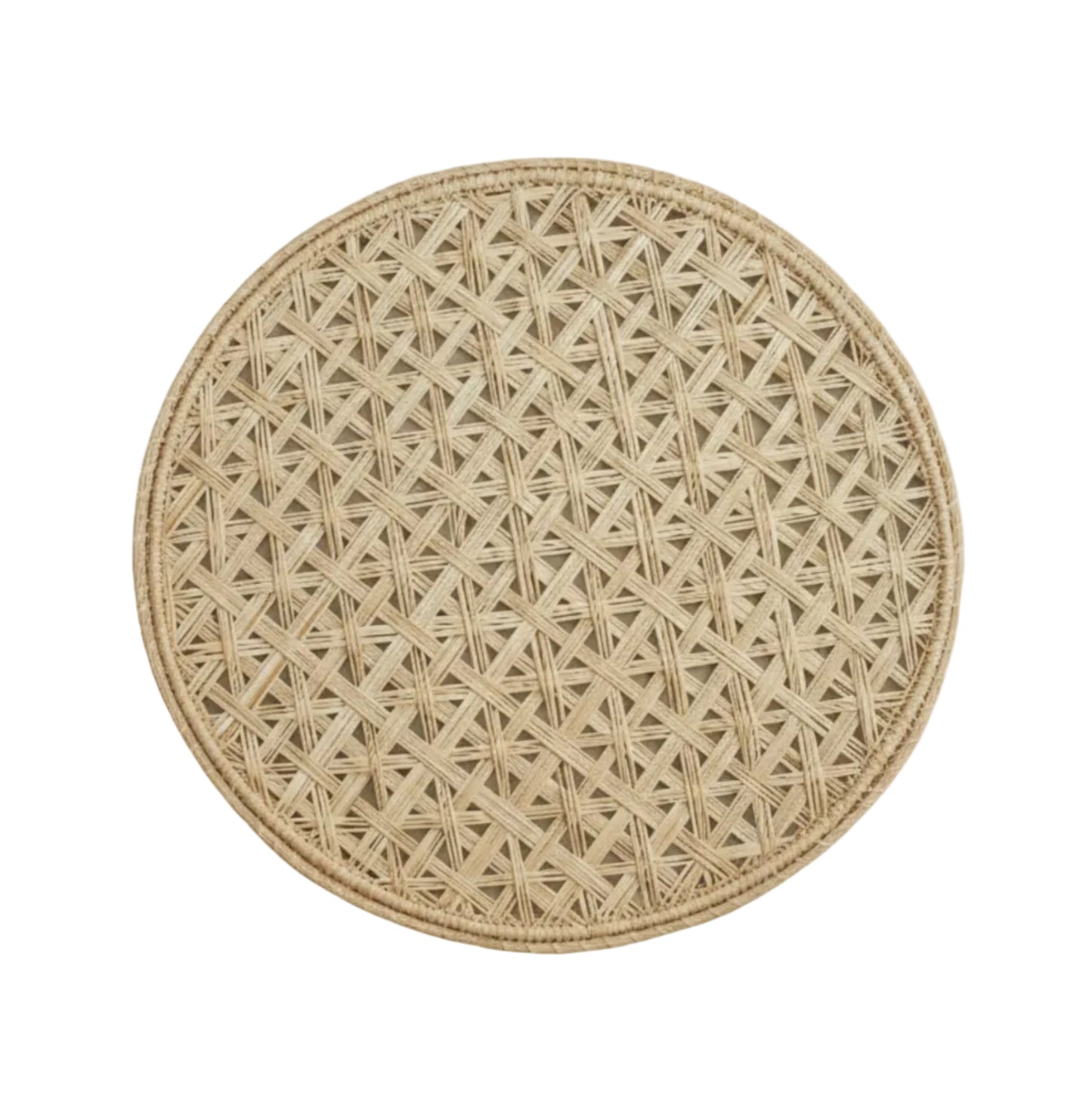 Cruces cross-weave placemat in natural, handwoven iraca palm, on a table