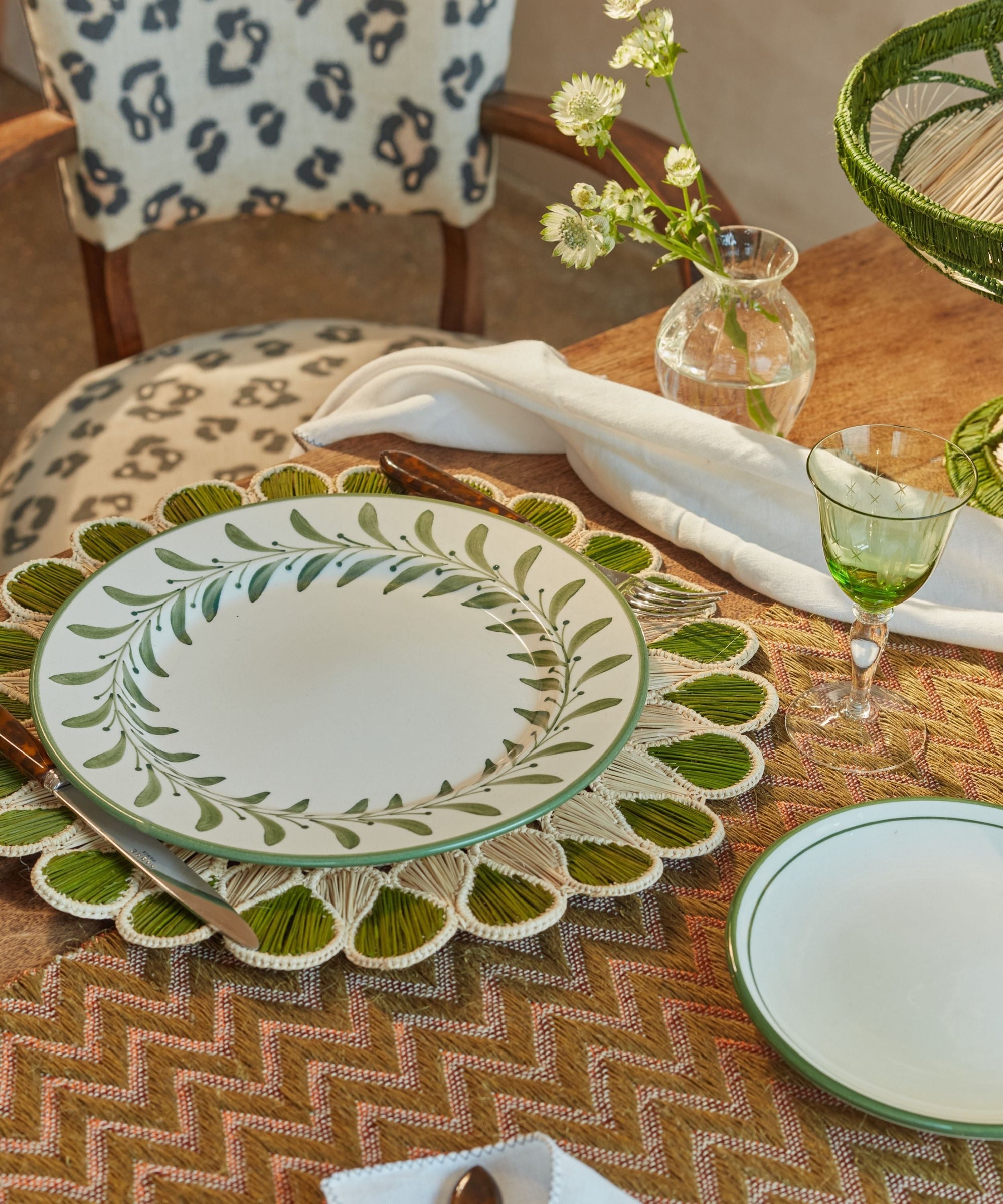 Lupita placemat in green, handwoven iraca palm, overhead view