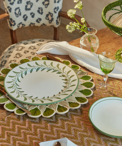Lupita placemat in green, handwoven iraca palm, overhead view