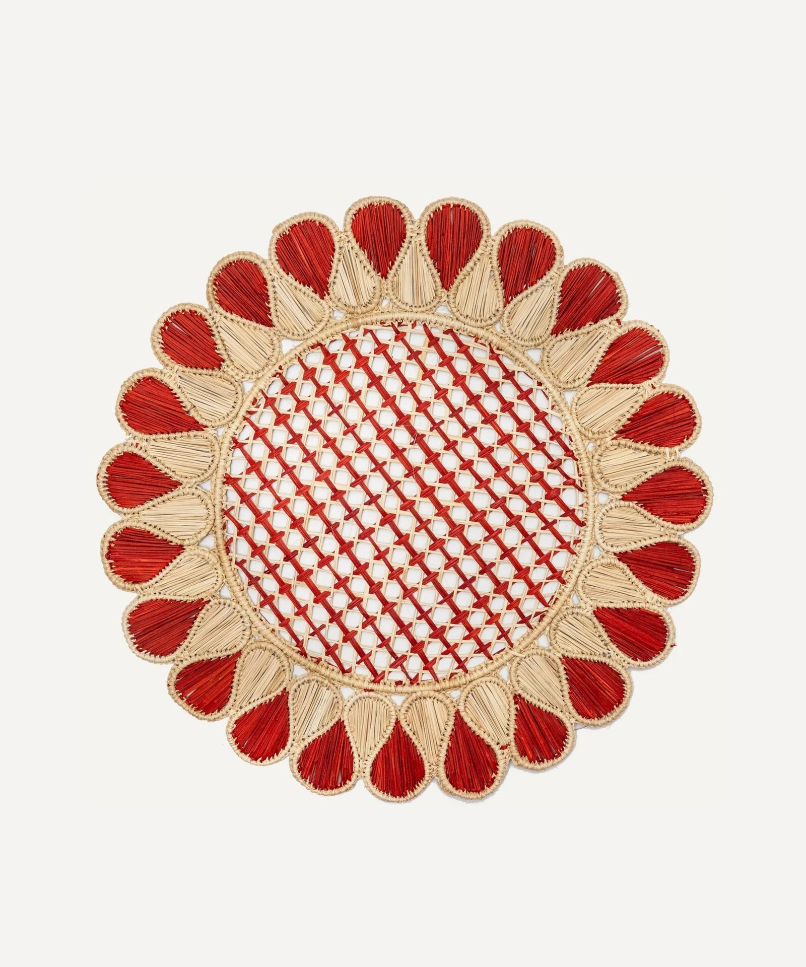 Lupita placemat in terracotta, handwoven iraca palm, styled on a table