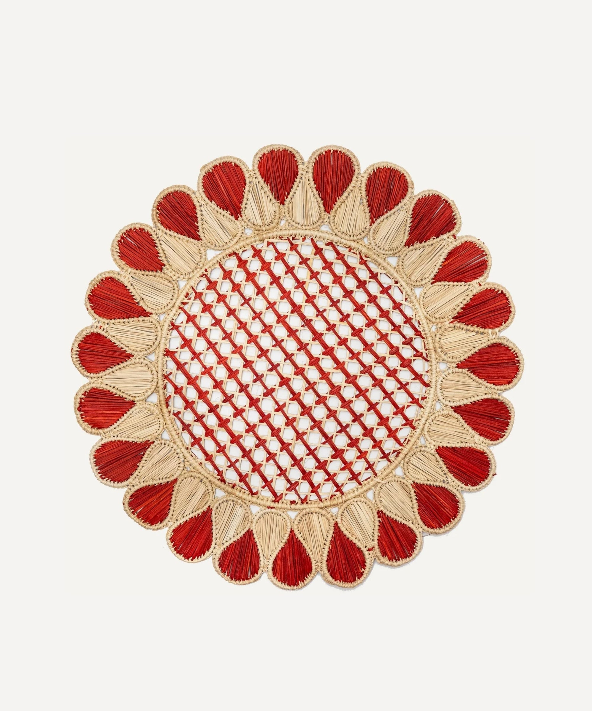 Lupita placemat in terracotta, handwoven iraca palm, styled on a table
