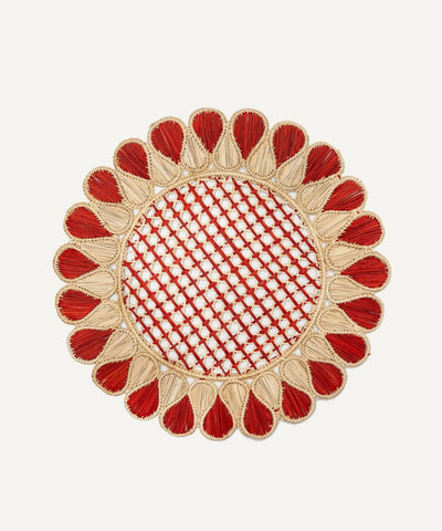 Lupita placemat in terracotta, handwoven iraca palm, styled on a table