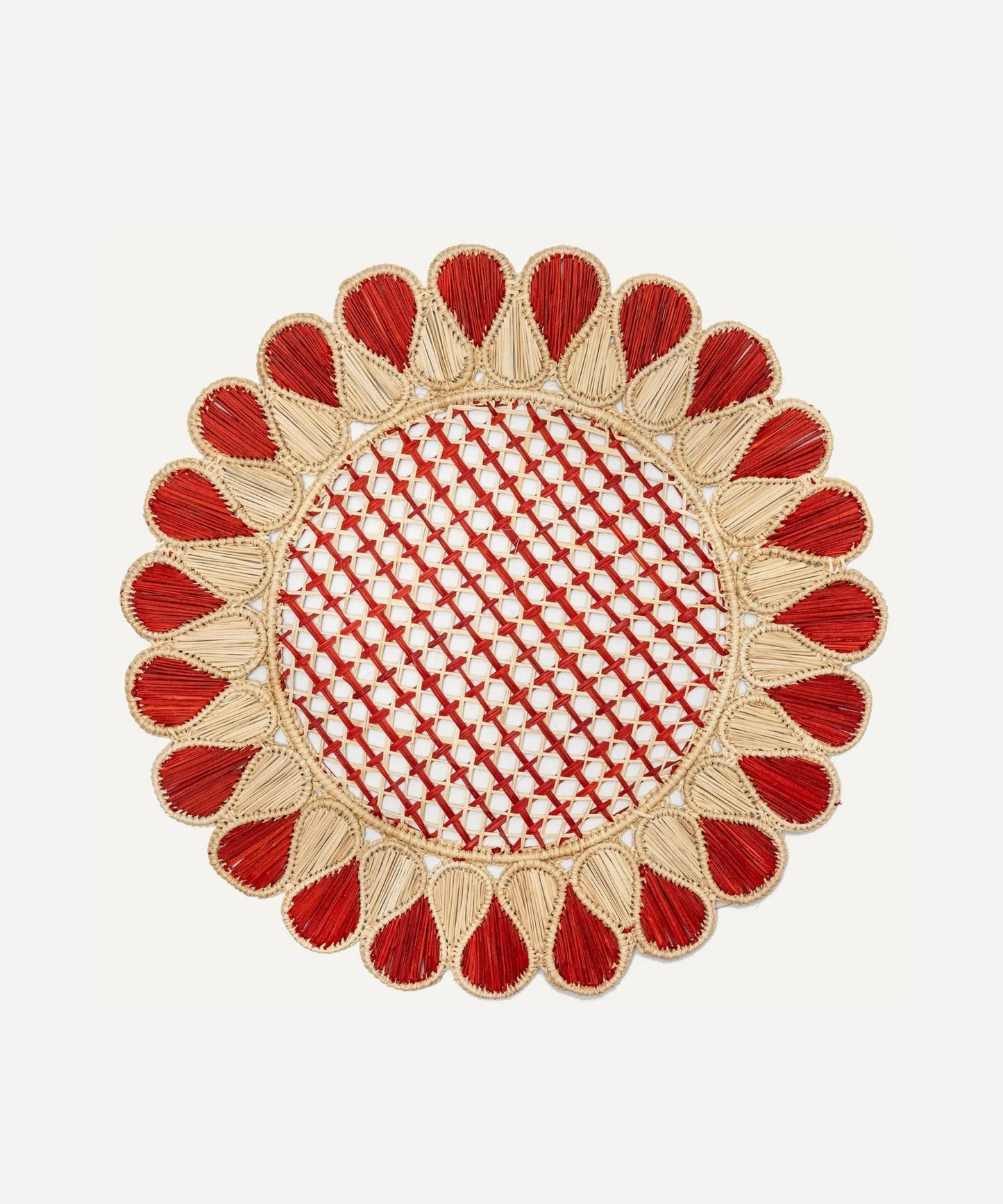 Lupita placemat in terracotta, handwoven iraca palm, styled on a table