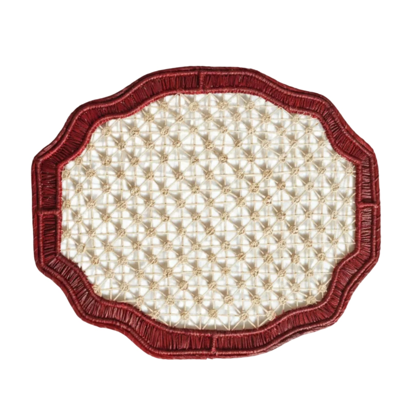 Deco geometric placemat in marsala, handwoven iraca palm, styled on a table